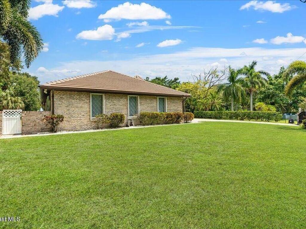 9140 S Tropical Trail, Merritt Island, FL 32952