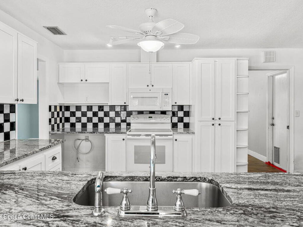 544 Solitaire Palm Drive, Indialantic, FL 32903