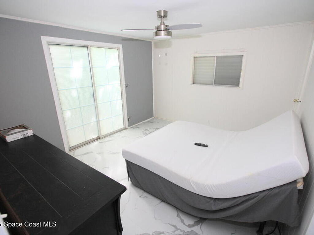 1082 Parkway Lane, Barefoot Bay, FL 32976