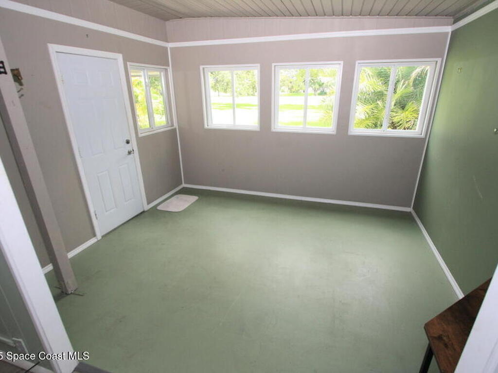 1082 Parkway Lane, Barefoot Bay, FL 32976