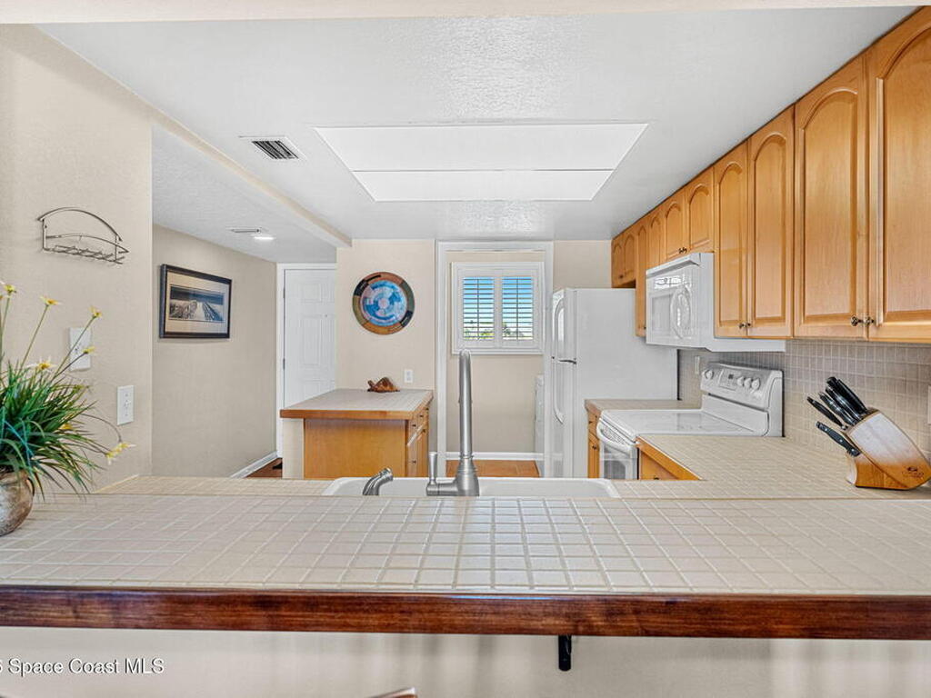 8498 Ridgewood Avenue, Cape Canaveral, FL 32920