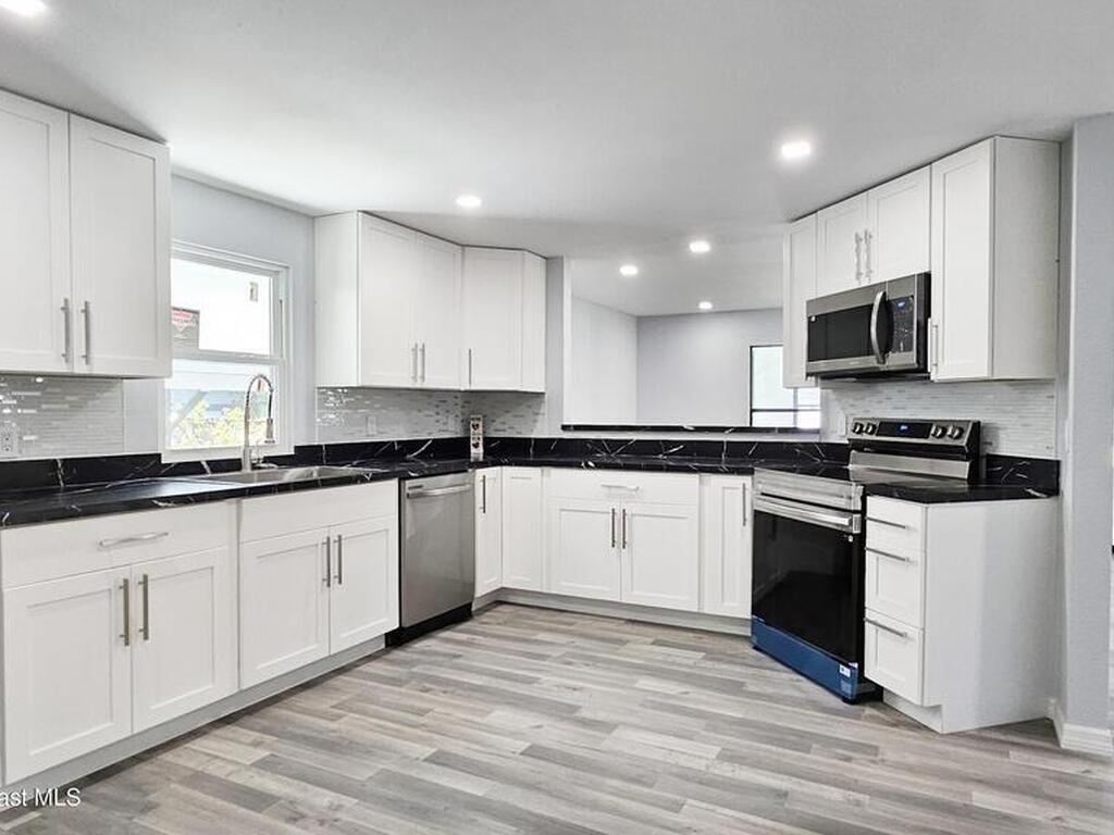 804 Waterway Drive, Barefoot Bay, FL 32976