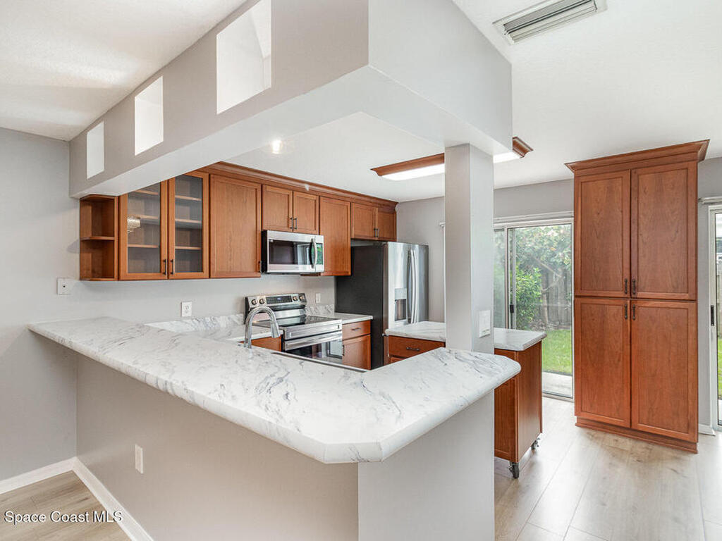 211 Cherie Down Lane, Cape Canaveral, FL 32920