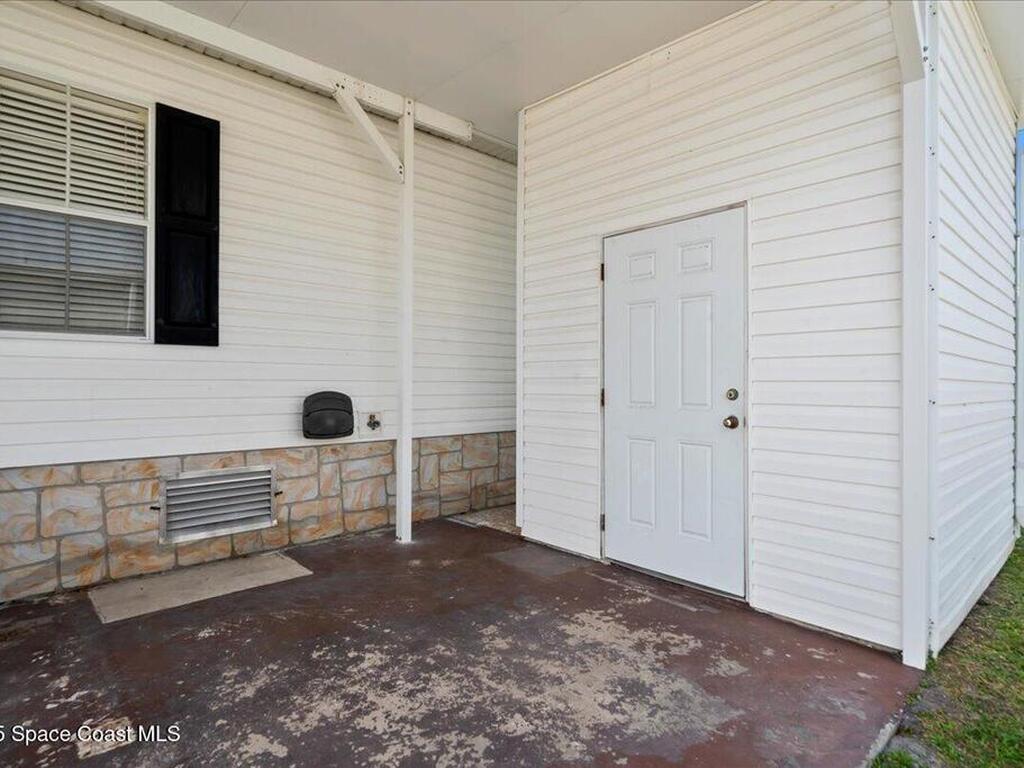 641 Hyacinth Circle, Barefoot Bay, FL 32976