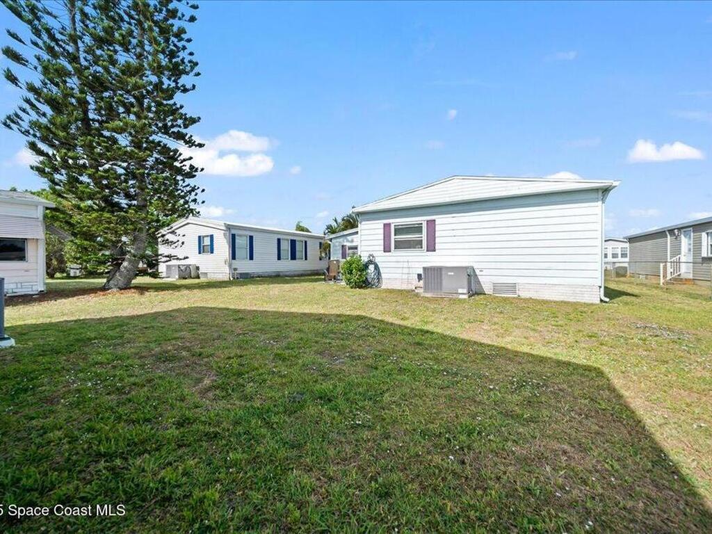 641 Hyacinth Circle, Barefoot Bay, FL 32976