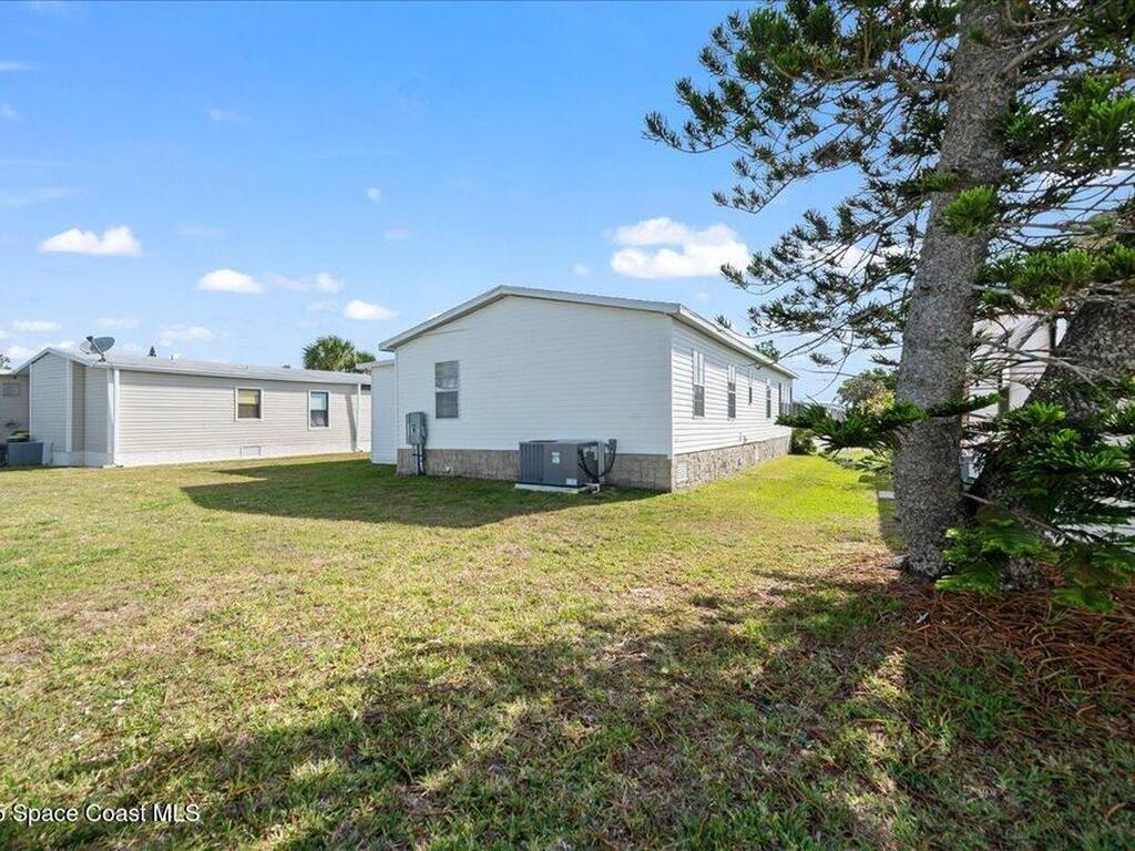 641 Hyacinth Circle, Barefoot Bay, FL 32976