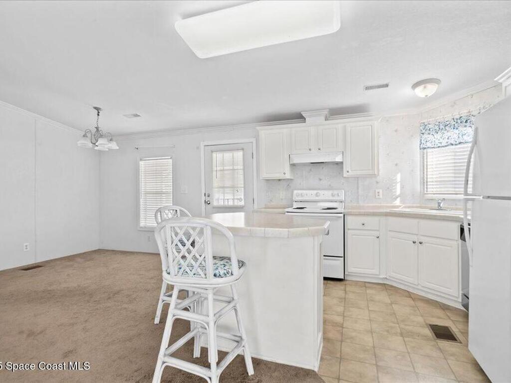 641 Hyacinth Circle, Barefoot Bay, FL 32976