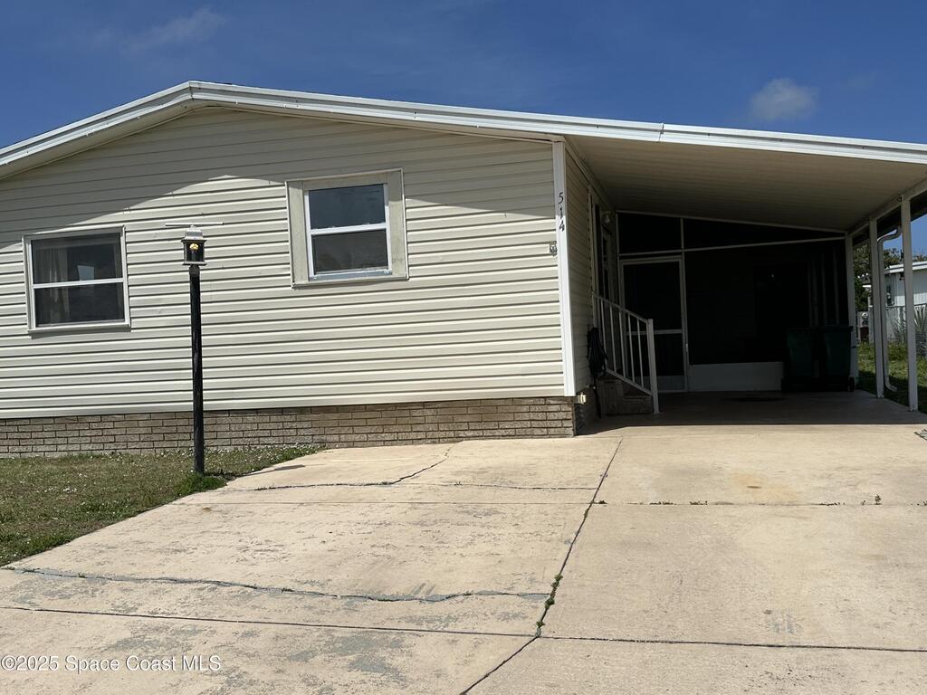 514 Puffin Drive, Barefoot Bay, FL 32976