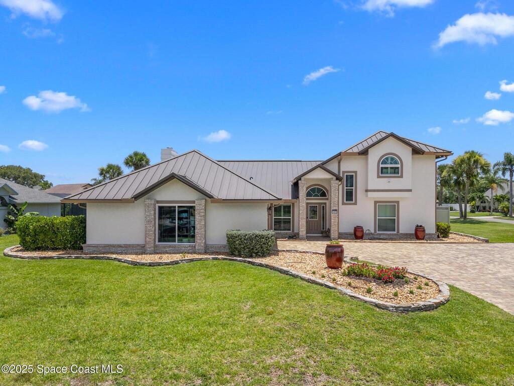 963 Spanish Wells Drive, Suntree, FL 32940