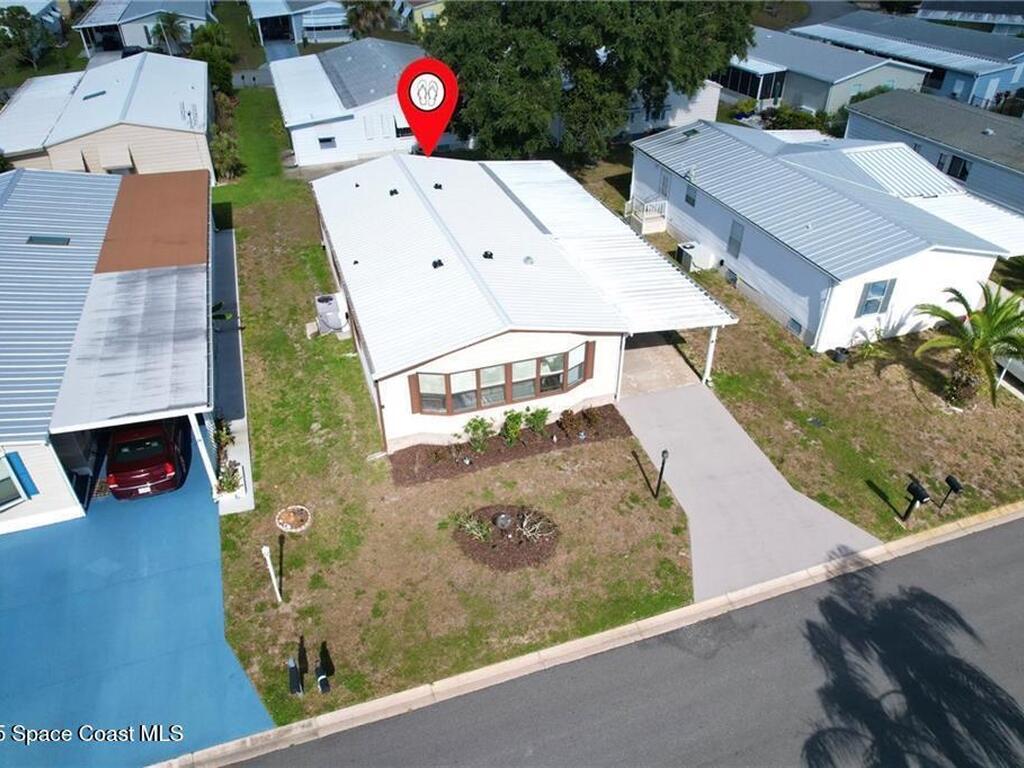 705 Hyacinth Circle, Barefoot Bay, FL 32976