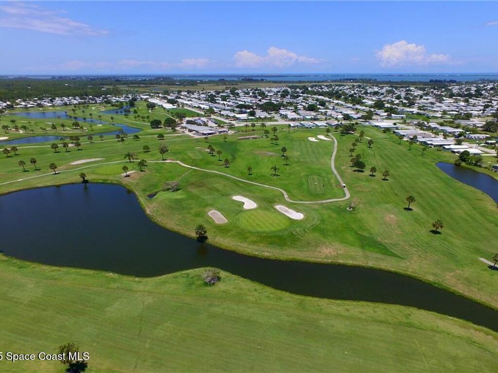 705 Hyacinth Circle, Barefoot Bay, FL 32976