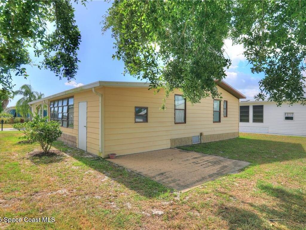 705 Hyacinth Circle, Barefoot Bay, FL 32976