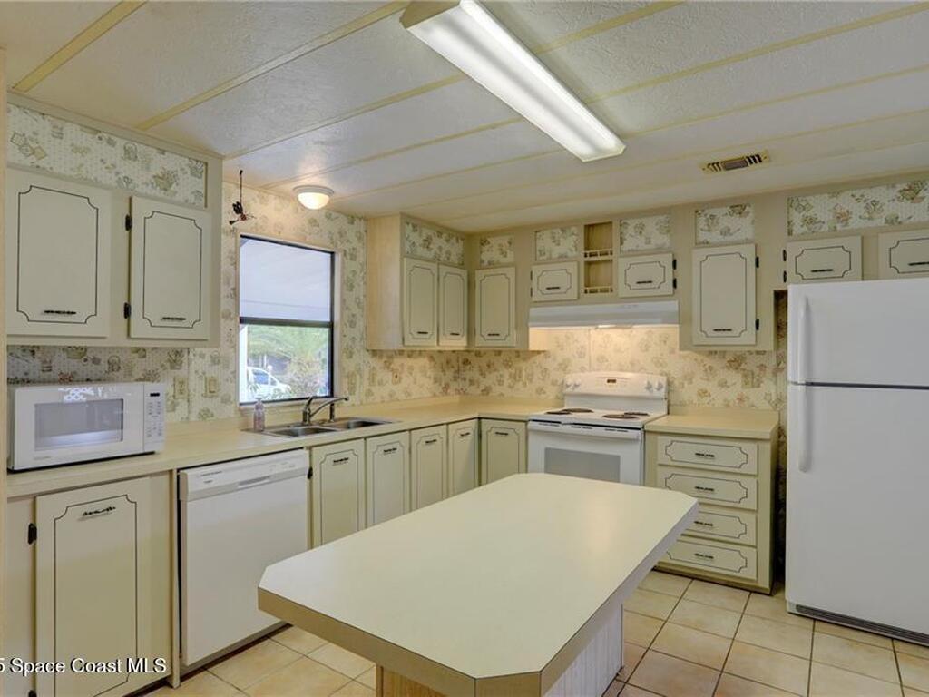 705 Hyacinth Circle, Barefoot Bay, FL 32976