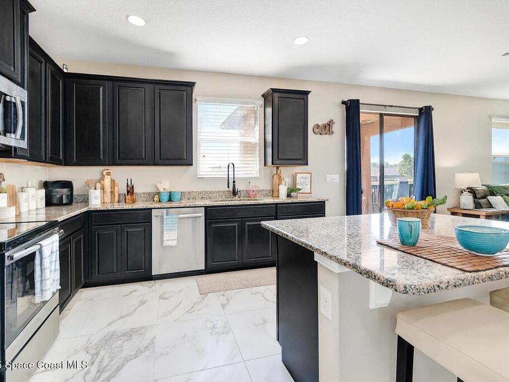 1414 Musgrass Circle, West Melbourne, FL 32904