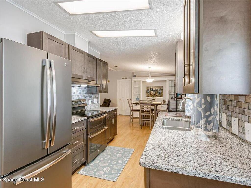 915 Hyacinth Circle, Barefoot Bay, FL 32976