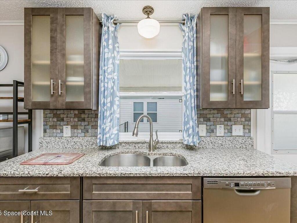 915 Hyacinth Circle, Barefoot Bay, FL 32976