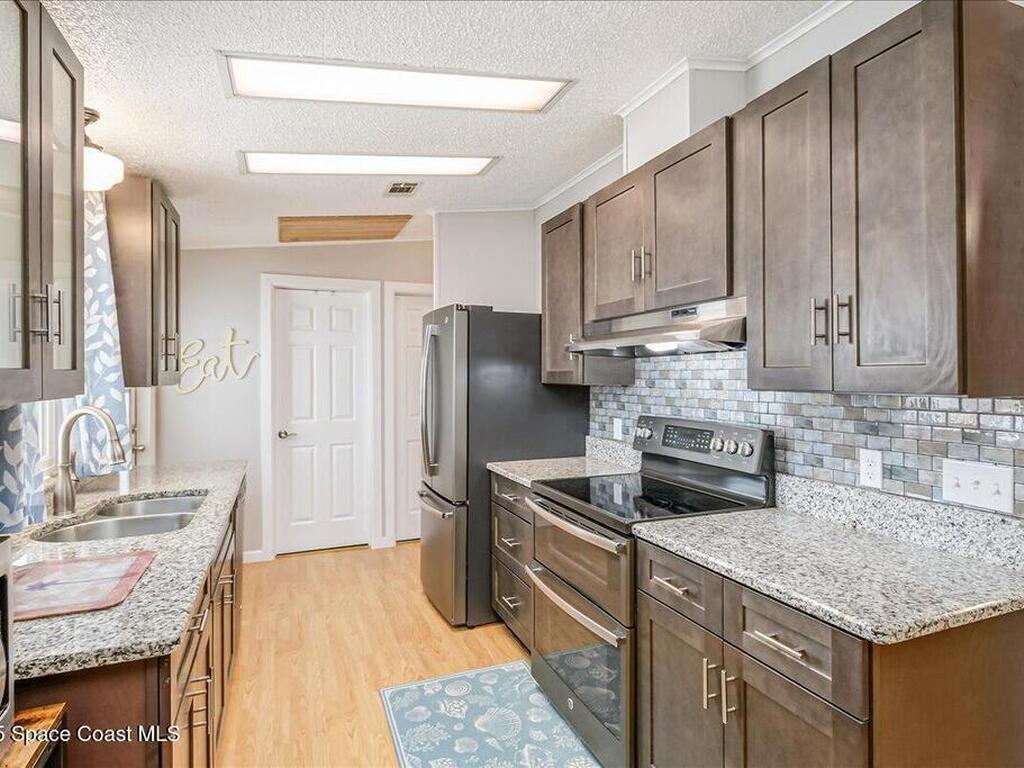 915 Hyacinth Circle, Barefoot Bay, FL 32976