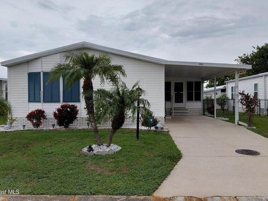 915 Hyacinth Circle, Barefoot Bay, FL 32976