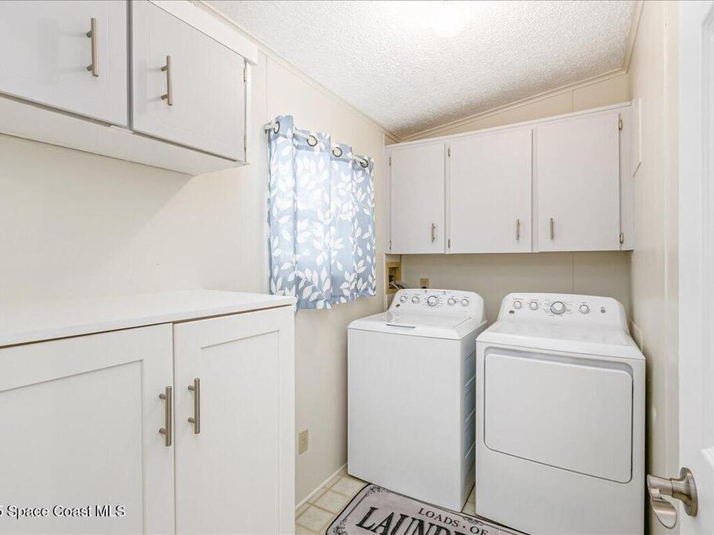 915 Hyacinth Circle, Barefoot Bay, FL 32976