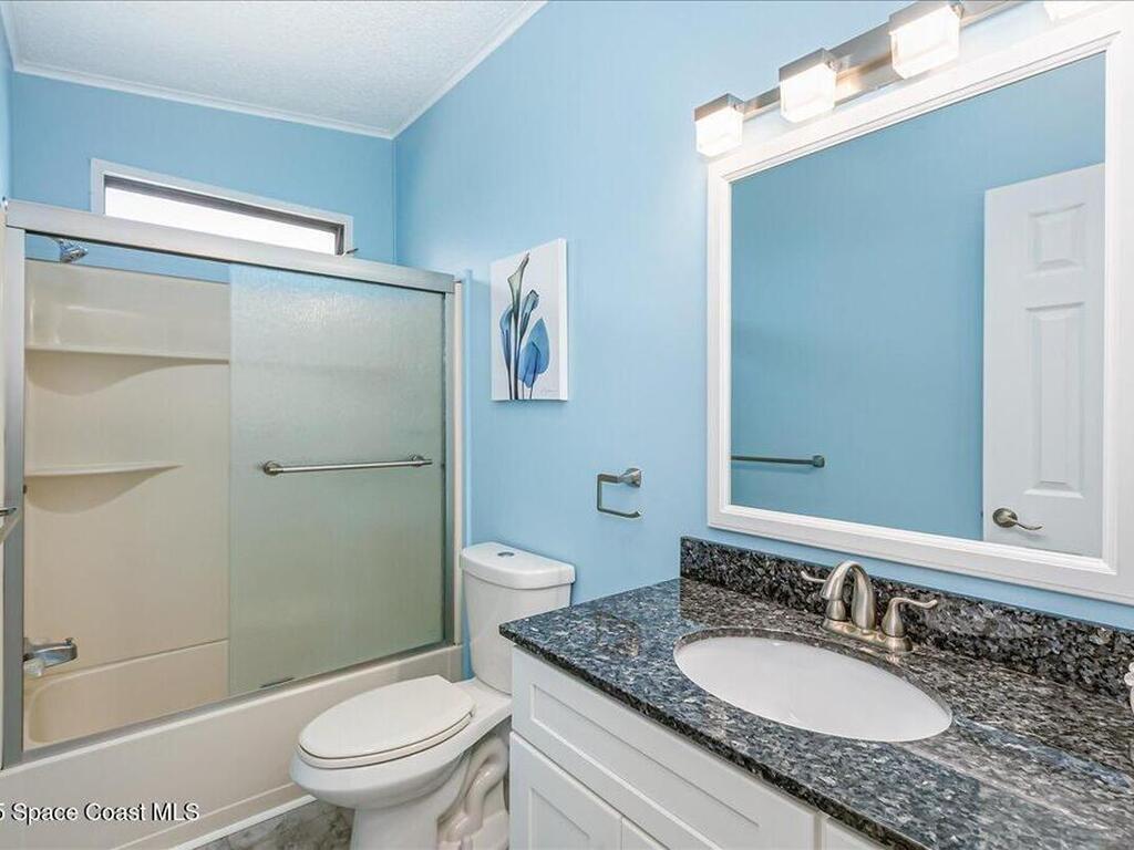 915 Hyacinth Circle, Barefoot Bay, FL 32976