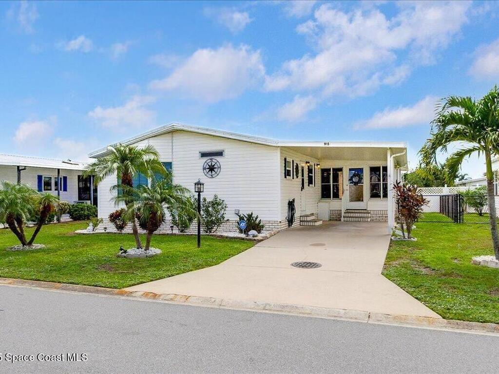 915 Hyacinth Circle, Barefoot Bay, FL 32976