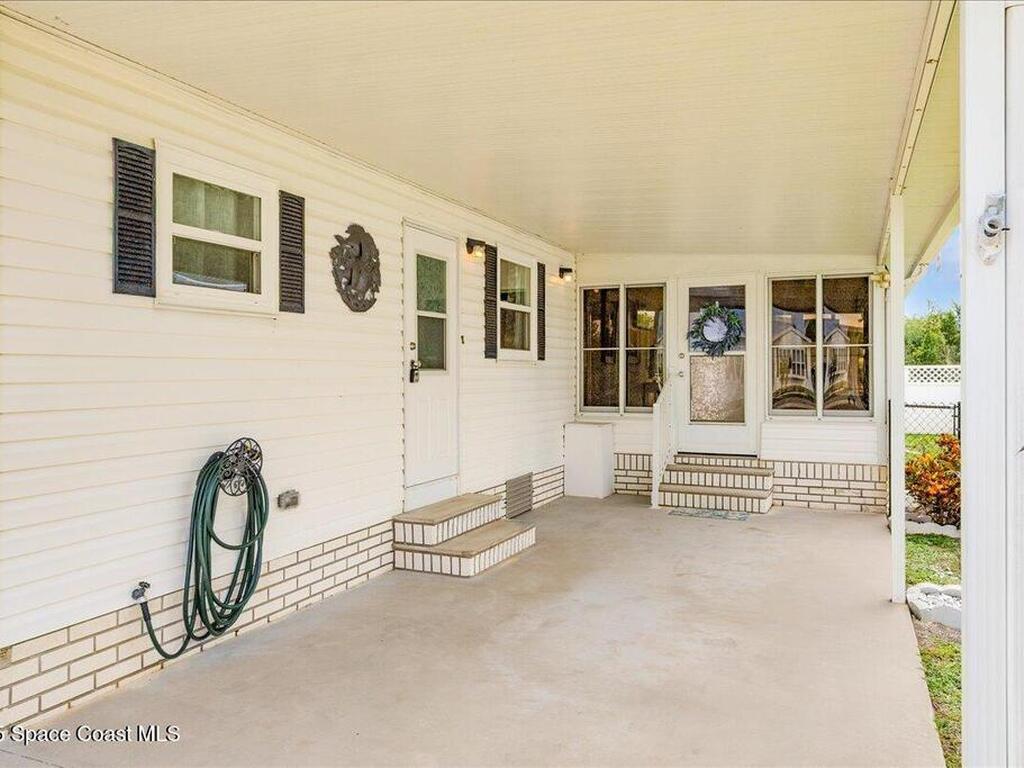 915 Hyacinth Circle, Barefoot Bay, FL 32976