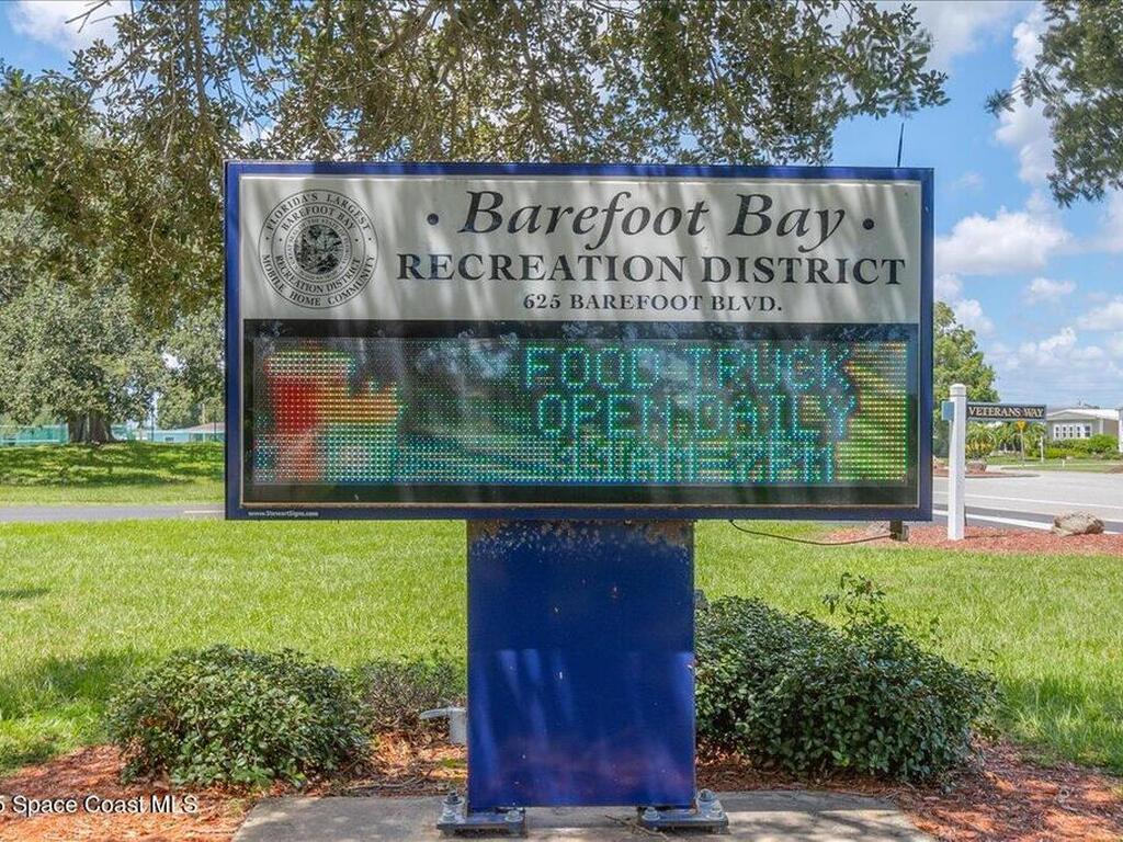 915 Hyacinth Circle, Barefoot Bay, FL 32976