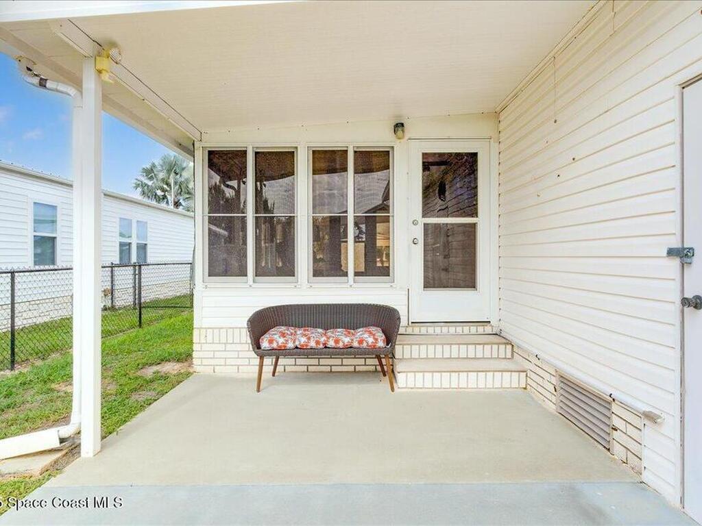 915 Hyacinth Circle, Barefoot Bay, FL 32976