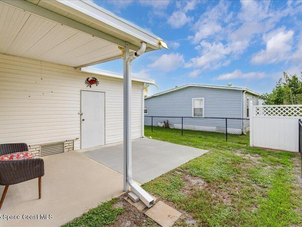 915 Hyacinth Circle, Barefoot Bay, FL 32976