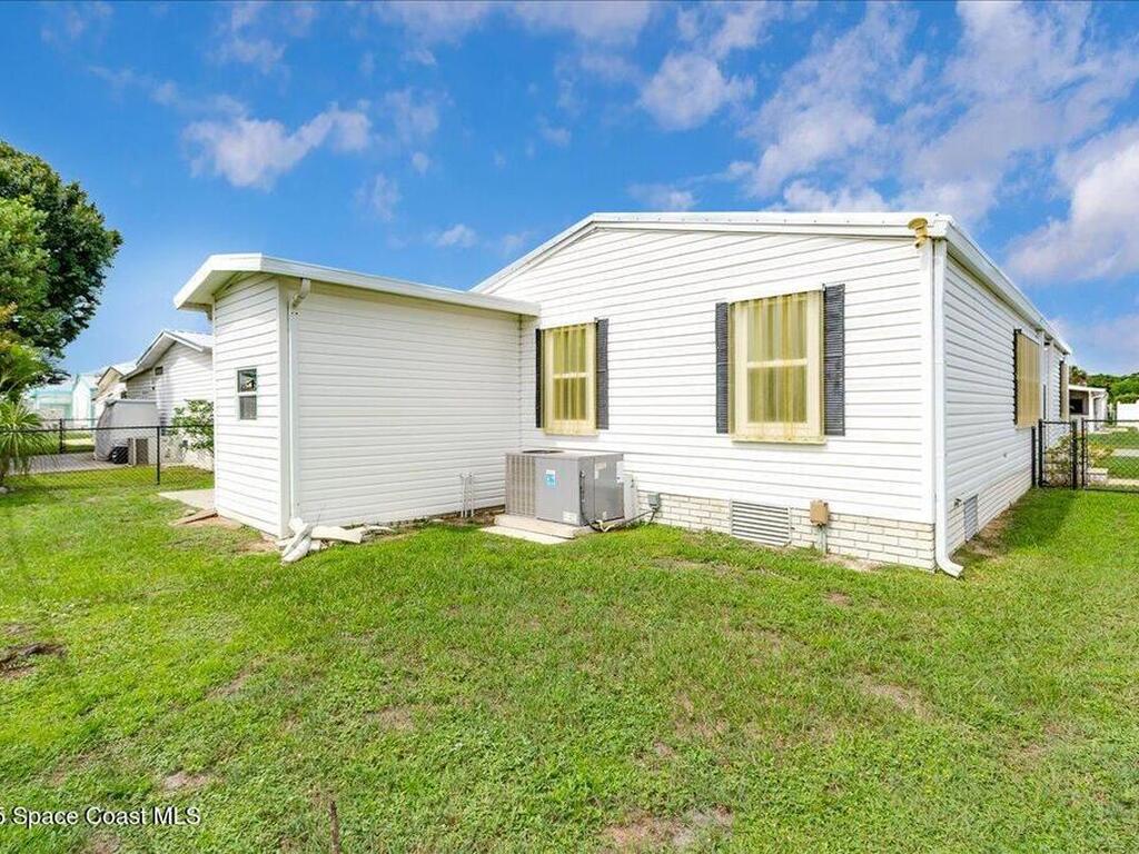 915 Hyacinth Circle, Barefoot Bay, FL 32976