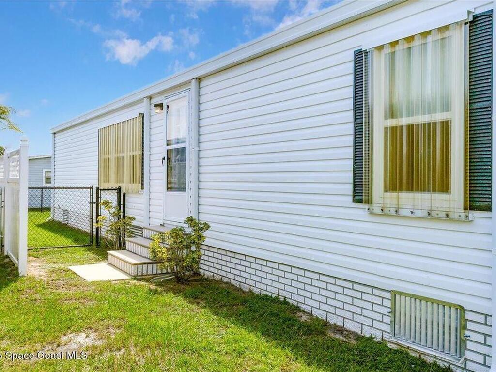 915 Hyacinth Circle, Barefoot Bay, FL 32976