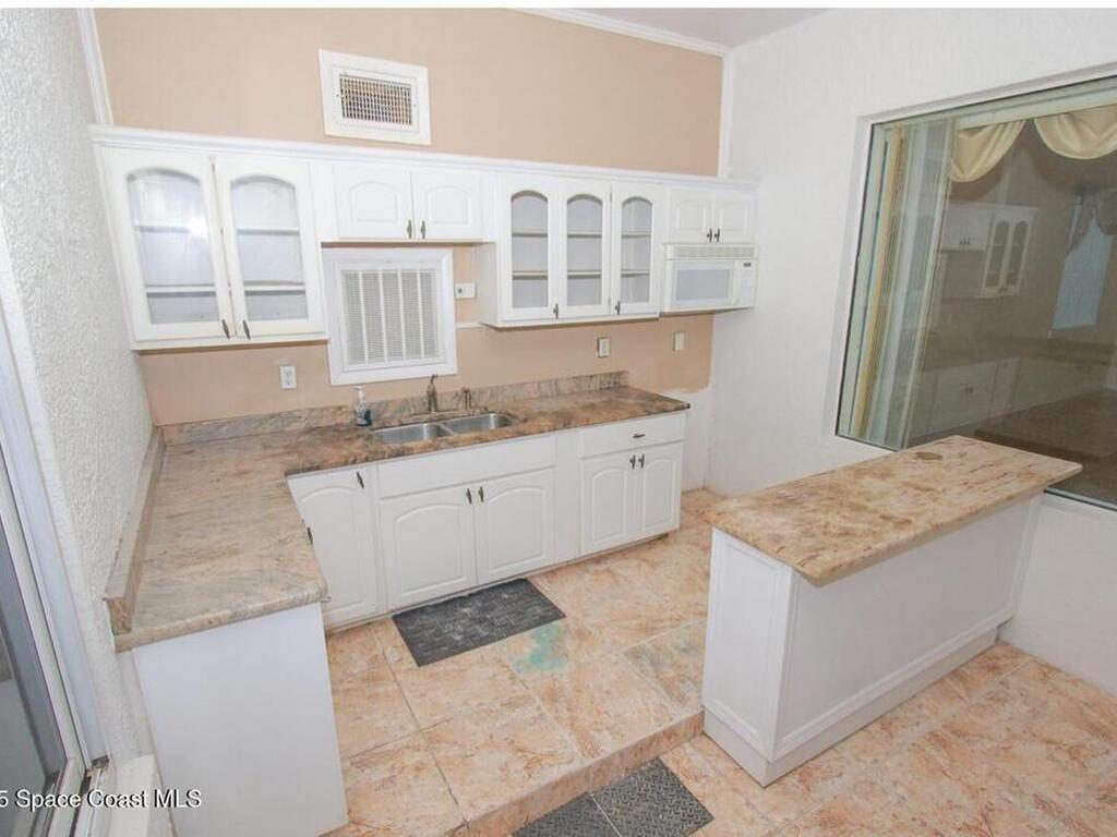 1857 Timbers West Boulevard, Rockledge, FL 32955