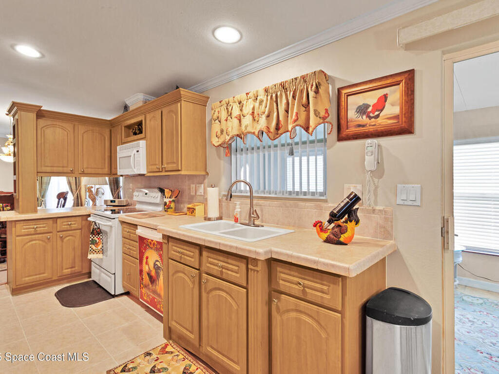 621 Puffin Drive, Barefoot Bay, FL 32976