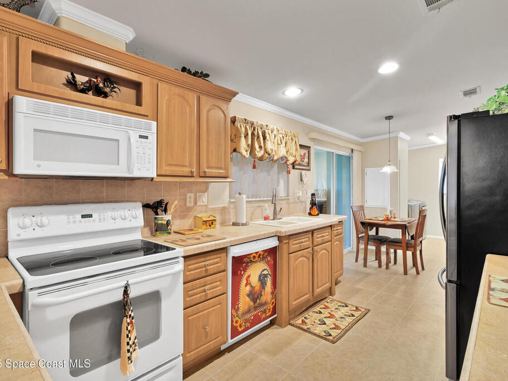 621 Puffin Drive, Barefoot Bay, FL 32976