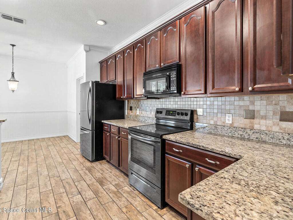 6913 Beargrass Road, Harmony, FL 34773