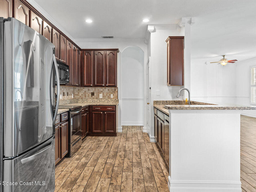 6913 Beargrass Road, Harmony, FL 34773