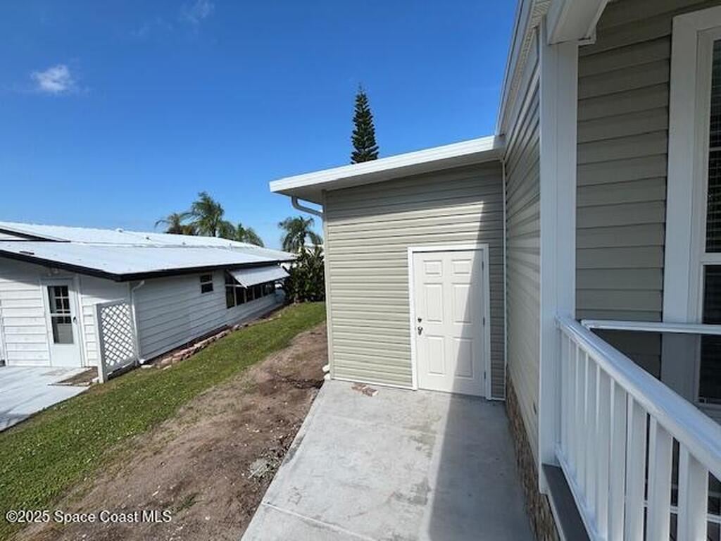 723 Hyacinth Circle, Barefoot Bay, FL 32976