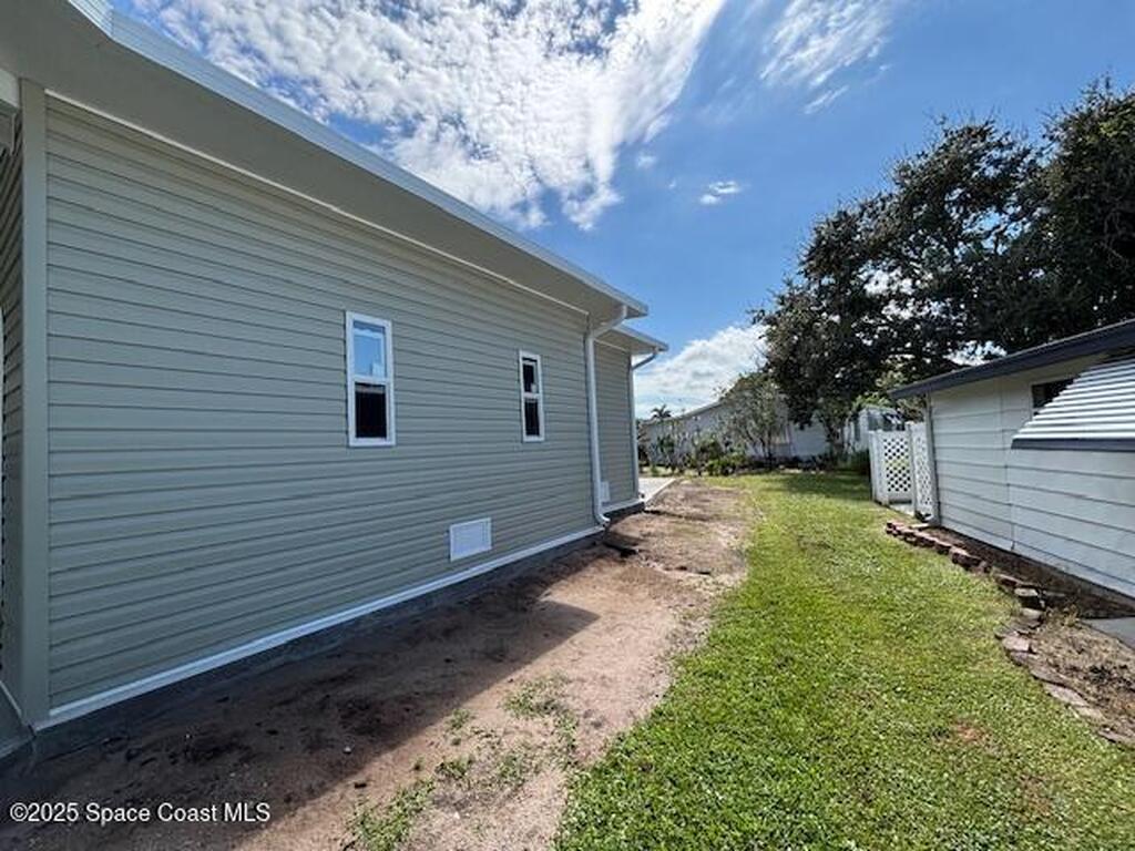 723 Hyacinth Circle, Barefoot Bay, FL 32976