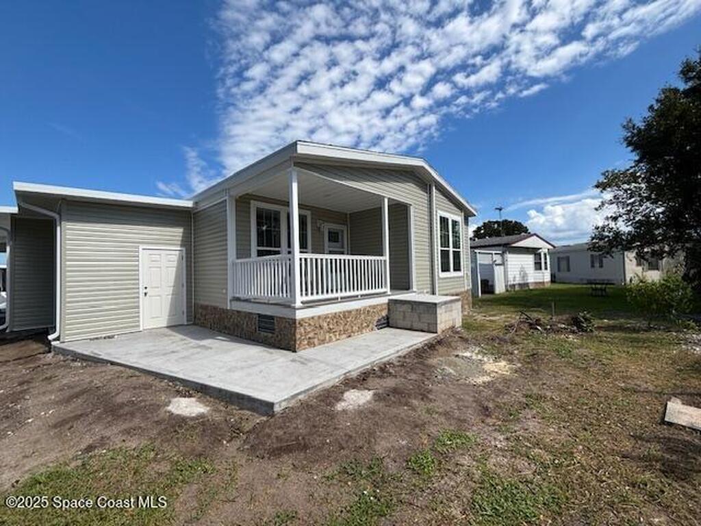 723 Hyacinth Circle, Barefoot Bay, FL 32976