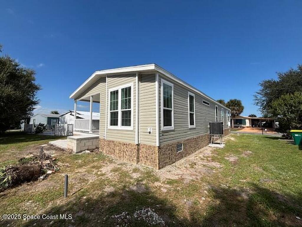 723 Hyacinth Circle, Barefoot Bay, FL 32976