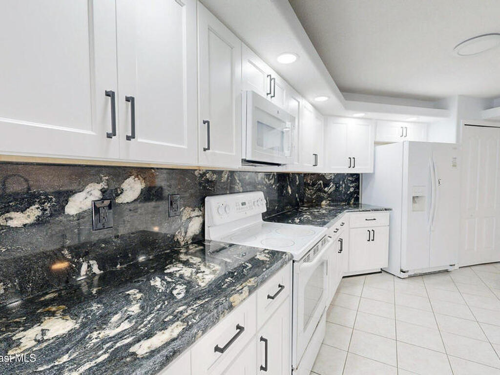 8935 Puerto Del Rio Drive, Cape Canaveral, FL 32920