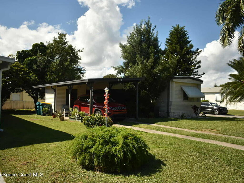 1251 Waterway Drive, Barefoot Bay, FL 32976