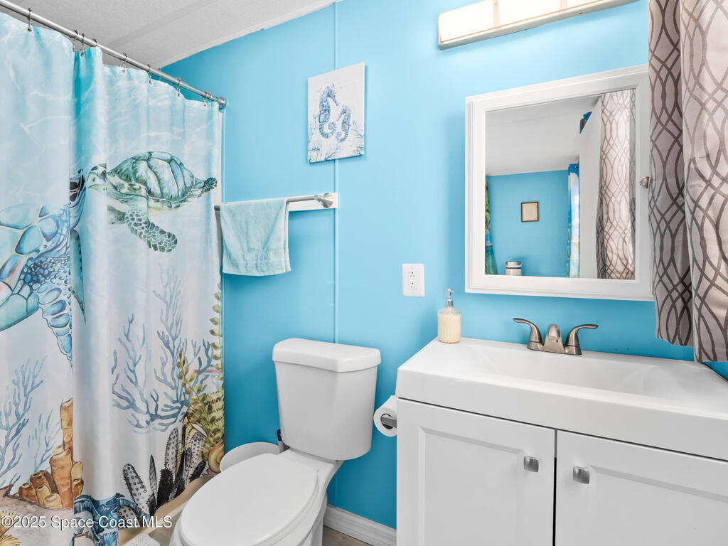 1040 Waterway Drive, Barefoot Bay, FL 32976